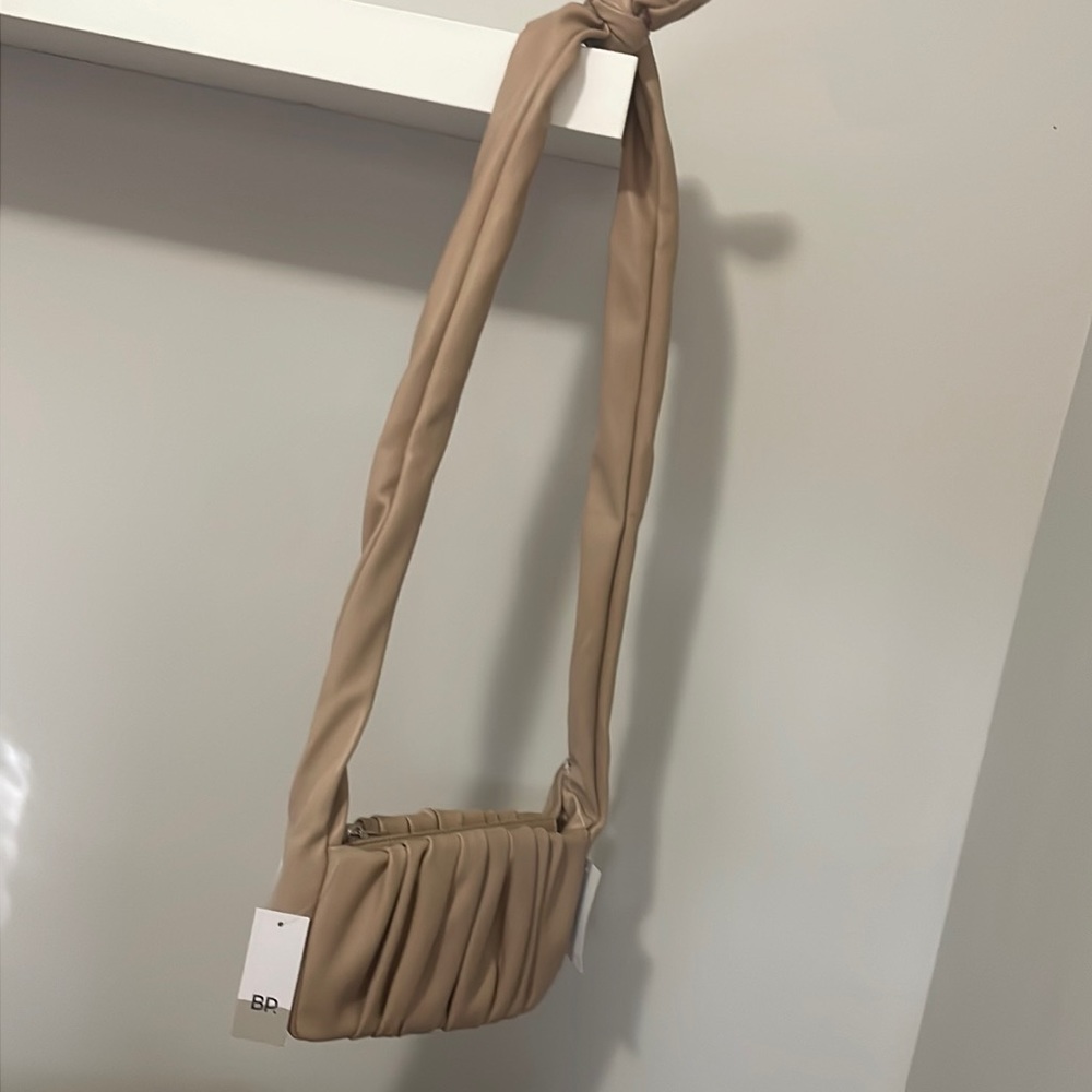 Small beige BP purse